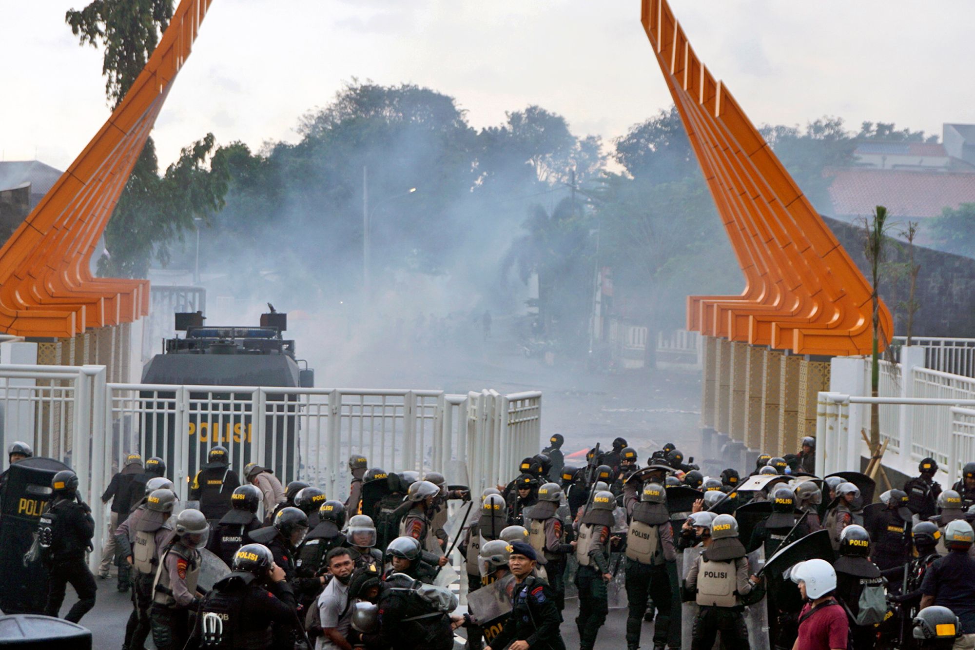 Indonesian Police Fire Tear Gas To Disperse Soccer Fans | The Seattle Times