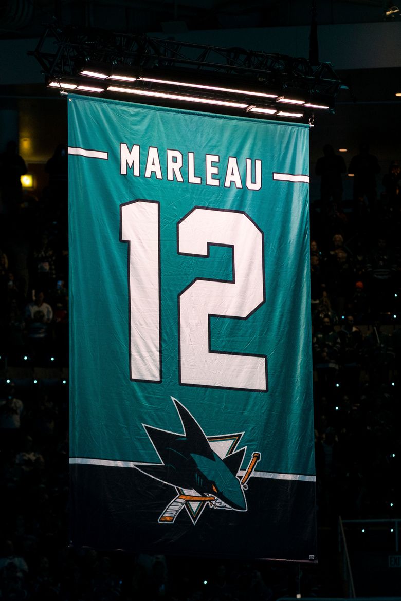 The Patrick Marleau jersey banner is raised to the rafters during the  News Photo - Getty Images