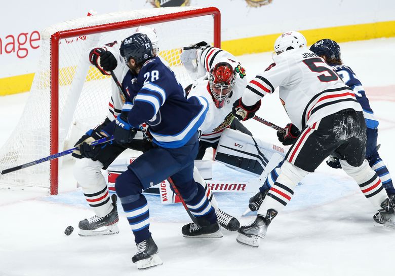 Wheeler scores 2 to lead Jets in 4-1 win over Blackhawks