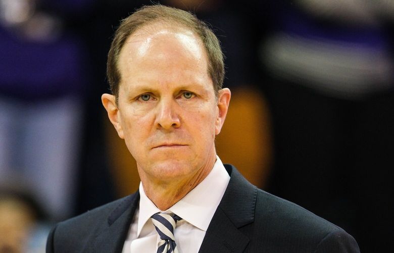 Mike Hopkins has his game face on – and even his sport coat – as the Huskies take the court against Stanford Thursday. 222764