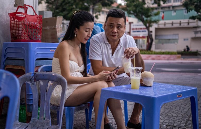 Nguyen Thi Anh Thy and her husband Jeffrey Chue in Ho Chi Minh City, Vietnam, Jan. 27, 2023. The couple, who created a Telegram account for subscribers where they posted risquŽ videos and photos of themselves while in Singapore, were convicted of violating the country’s nudity and obscenity laws, and of obstructing justice, and fined $17,000. (Linh Pham/The New York Times) XNYT119 XNYT119