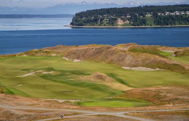Chambers Bay public golf course in University Place, Washington, southwest of Tacoma with sweeping views of Puget Sound and the Olympic Mountains.
Photographed on June 18, 2020.