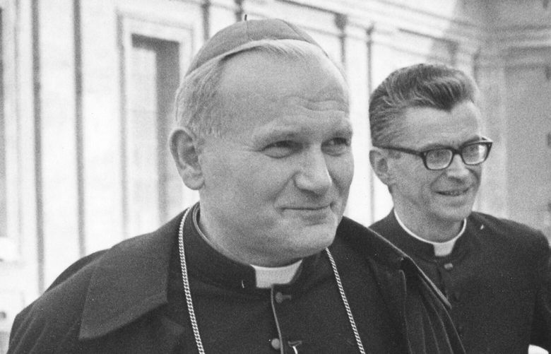 FILE – Karol Cardinal Wojtyla, archbishop of Krakow, Poland, foreground, arrives to take part in Oct. 22, 1971 working session of the World Synod of Bishops at the Vatican. Pope St. John Paul II knew about sexual abuse of children by priests under his authority and sought to conceal it when he was an archbishop in his native Poland, according to a television news report. In a story that aired late Monday, March 6, 2023, Polish channel TVN24 named three priests whom the future pope then known as Archbishop Karol Wojtyla had moved among parishes during the 1970s, including one who was sent to Austria, after they were accused of abusing minors. (AP Photo/Gianni Foggia) ALP101 ALP101