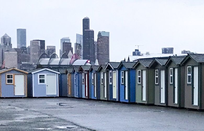 New tiny homes that so far have no home, pictured earlier in January, are being stored on an industrial lot in Sodo, south of downtown Seattle.