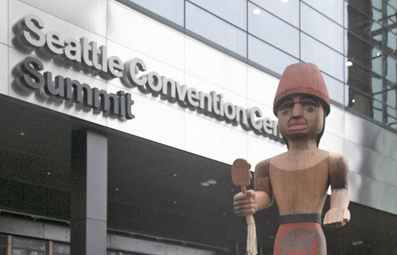The new convention center, SUMMIT, officially opened Wednesday, January 25, 2023.. The SUMMIT complex is North of the present convention center, and will operate simultaneously. 
Facing West, “Mowitch Man,”  one of two Coast Salish welcome figures carved by artist Andrea Wilbur-Sigo. 222822