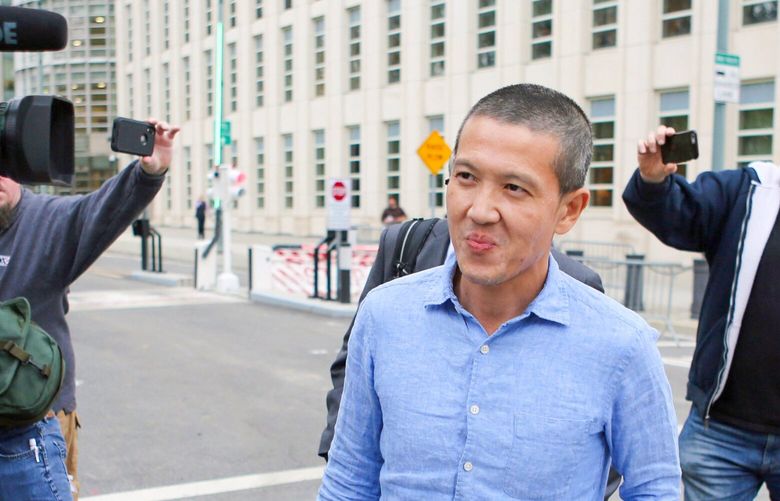 FILE — Roger Ng, a former Goldman Sachs banker, leaves federal district court in the Brooklyn borough of New York, May 6, 2019. Ng was convicted on Friday, April 8, 2022, on bribery and money-laundering charges stemming from a global fraud scandal: the looting of more than $4 billion from a Malaysian sovereign wealth fund. (Jefferson Siegel/The New York Times) 