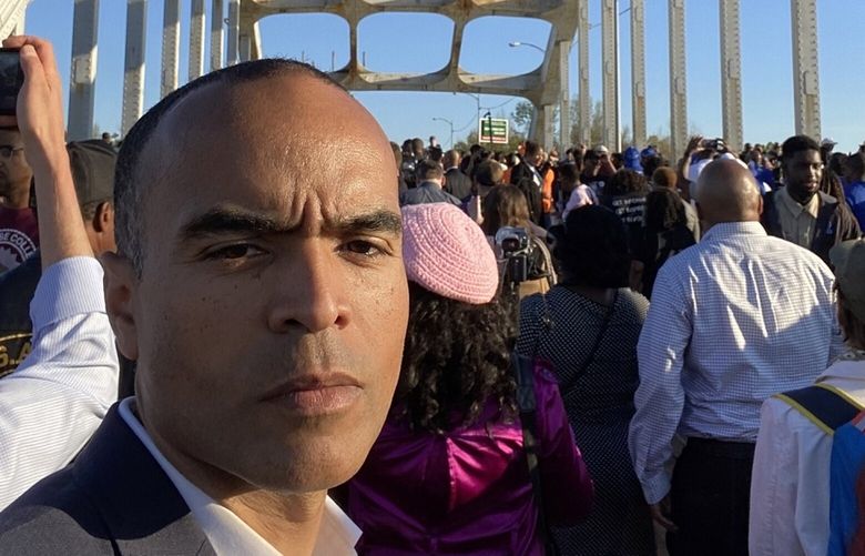 Nick Brown, U.S. Attorney for the Western District of Washington, crosses the Edmund Pettus Bridge on March 5, in Selma, Alabama, to commemorate the 58th anniversary of the landmark “Bloody Sunday” march, which galvanized the civil rights movement and helped lead to an expansion of voting rights.