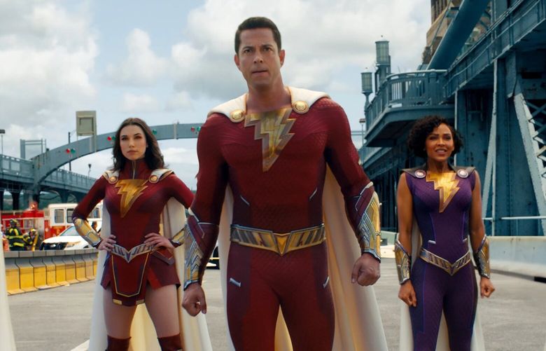 Adopted siblings share the power to turn from kids to adult superheroes in “Shazam: Fury of the Gods.” (Warner Bros. Pictures)