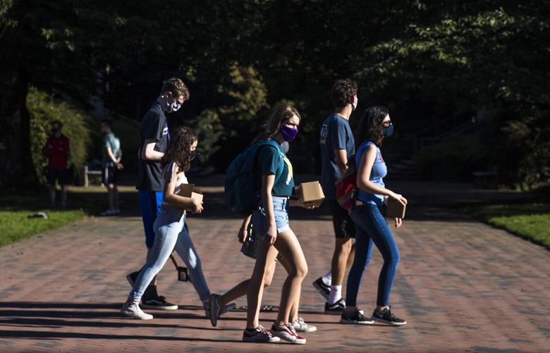 A group of University of Washington students walk down The Quad as students return to the campus and classes go online due to the coronavirus pandemic.


Tuesday, Sept. 29, 2020 215220
