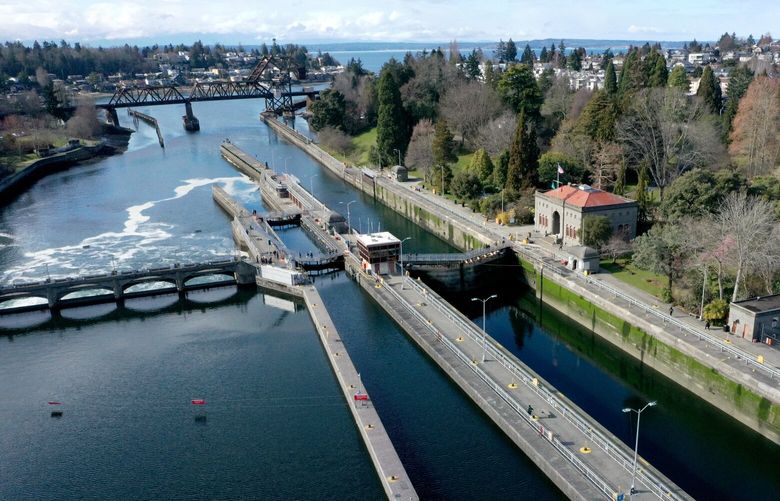 The Ballard Locks photographed with a drone looking west towards the Salmon Bay Waterway and Shilshole Bay on Saturday, March 11, 2023. There was a collision in the Ballard Locks, Hiram M. Chittenden Locks, last May that is now going to court.