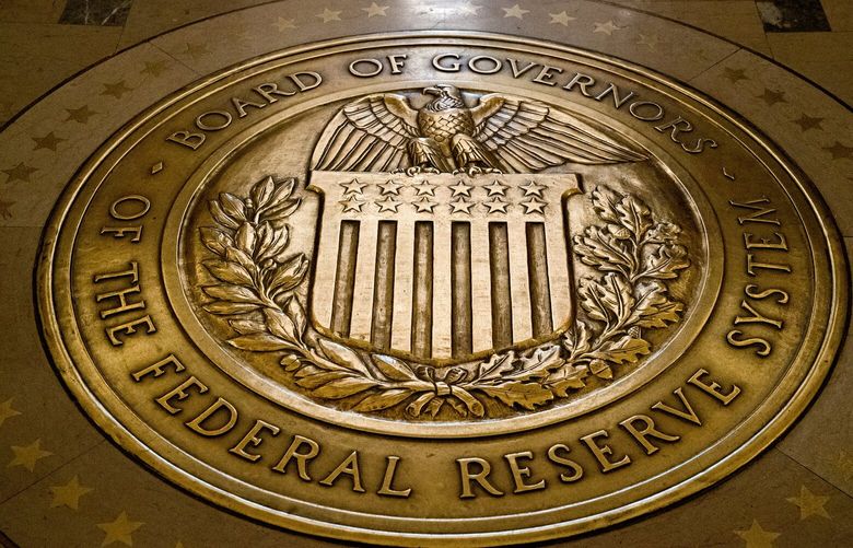 The seal of the Board of Governors of the United States Federal Reserve System is displayed in the ground at the Marriner S. Eccles Federal Reserve Board Building in Washington, Feb. 5, 2018.  (AP Photo/Andrew Harnik, File) 