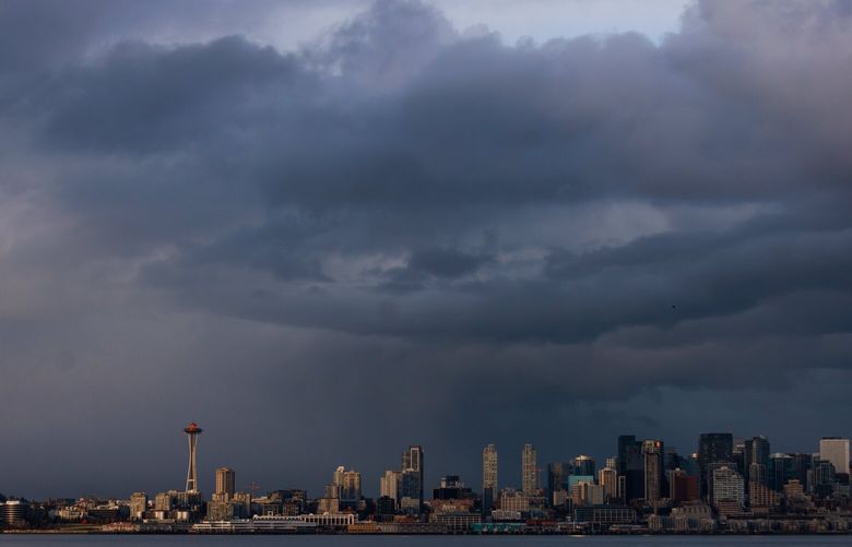 Storm clouds are seen above the Seattle skyline Monday, Feb. 27, 2023.  
LO 223190
