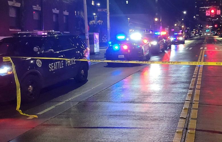 Seattle police investigate a homicide in Belltown early Monday, March 6, 2023.