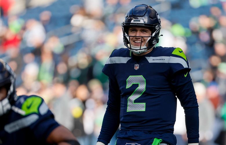 Seattle Seahawks quarterback Drew Lock laughs during warm-ups before the start of a game against the New York Jets. 222601