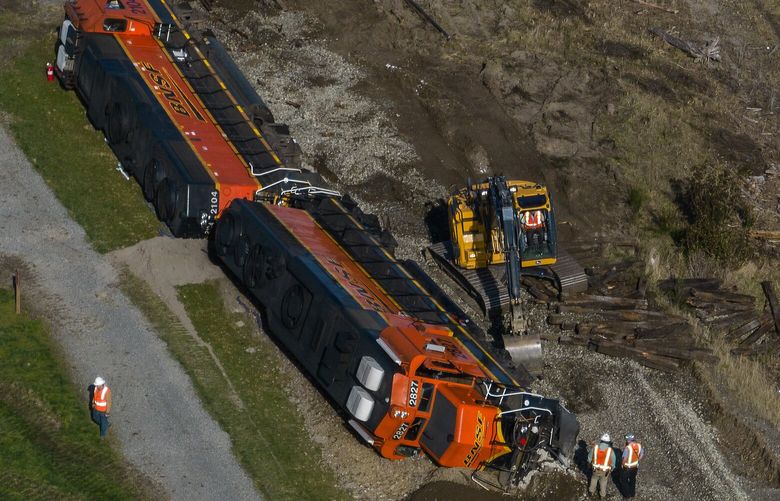 A derailed BNSF train on the Swinomish Reservation in Anacortes is seen from the air, Thursday, March, 16, 2023.