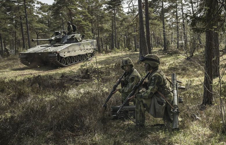 FILE — Swedish soldiers conduct a training exercise on Gotland Island, Sweden on May 11, 2022. President Recep Tayyip Erdogan of Turkey gave the go-ahead on March 17, 2023 for Finland’s application to join NATO, removing a significant hurdle for the Nordic nation’s bid to join the alliance but leaving its neighbor, Sweden, on the sidelines for now. (Sergey Ponomarev/The New York Times)