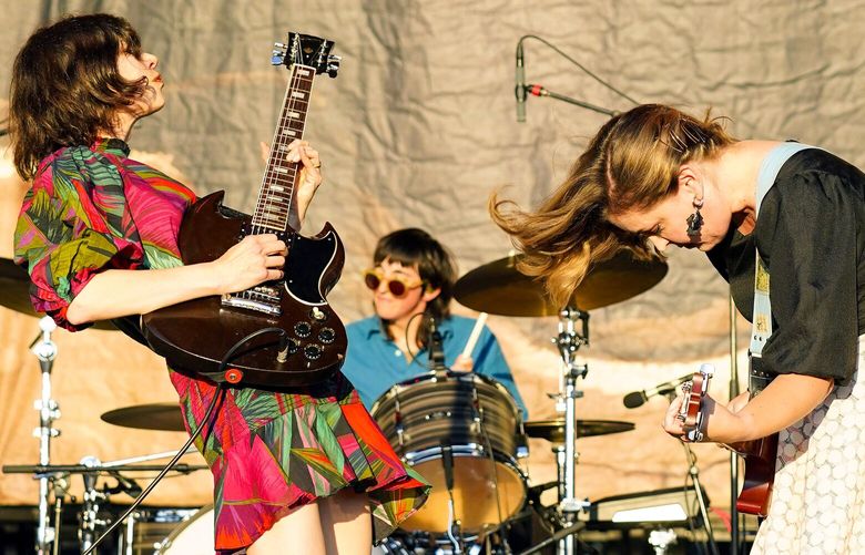 Carrie Brownstein, left, and Corin Tucker of Sleater Kinney perform on day three of Riot Fest on Sunday, Sept. 18, 2022, at Douglass Park in Chicago. ILRG115