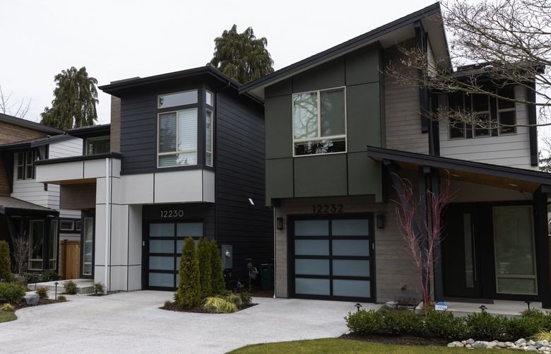 Four homes were built as a  development in Kirkland’s Rose Hill neighborhood, Thursday, March 9, 2023. Kirkland gives developers a choice to build lots with single or multiple dwellings, hoping to spur middle housing choices in the long-term for future buyers. 223259