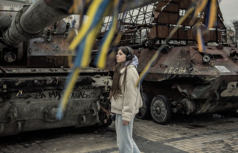 A girl surveys destroyed Russian military vehicles on display in front of St. Michael’s Golden-Domed Monastery, at Mykhailivska Square in Kyiv, Ukraine on March 13, 2023. China’s top leader, Xi Jinping, will travel to Russia to meet with President Vladimir Putin next week in a visit that could have broad implications for Moscow’s war in Ukraine and the troubled relationship between Beijing and Washington. (Laetitia Vancon/The New York Times) XNYT18 XNYT18