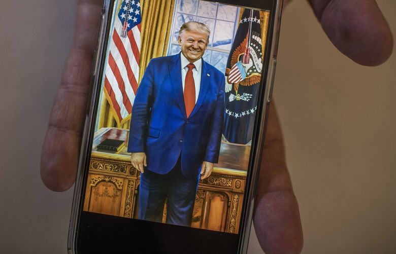 Francisco Antonio López Benavides, a Salvadoran artist, showing part of a life-size portrait of former President Donald Trump that he was commissioned to paint in 2020, in his home studio in Chinameca, El Salvador on March 20, 2023. The portrait is one of several gifts to the presidential family that is now unaccounted for. (Daniele Volpe/The New York Times) XNYT93 XNYT93