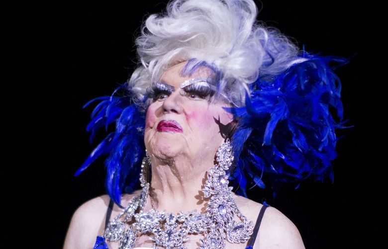 In this Sept. 2019 photo,  Darcelle XV, performs in Portland, Ore. Walter C. Cole, better known as the iconic drag queen who performed for decades as Darcelle, has died of natural causes in Portland, Ore, on Thursday, March 24, 2023. (Beth Nakamura/The Oregonian via AP) ORPOR503 ORPOR503