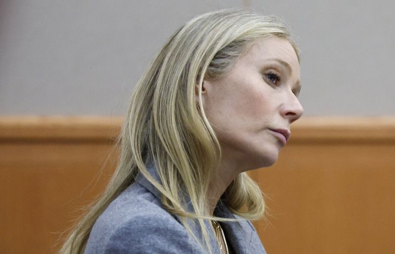 Gwyneth Paltrow sits in court during an objection by her attorney during her trial, Thursday, March 23, 2023, in Park City, Utah, where she is accused in a lawsuit of crashing into a skier during a 2016 family ski vacation, leaving him with brain damage and four broken ribs. Terry Sanderson claims that the actor-turned-lifestyle influencer was cruising down the slopes so recklessly that they violently collided, leaving him on the ground as she and her entourage continued their descent down Deer Valley Resort, a skiers-only mountain known for its groomed runs, après-ski champagne yurts and posh clientele. (AP Photo/Jeff Swinger, Pool) UTJS117 UTJS117