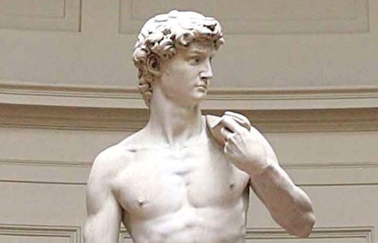 ** FILE ** Michelangelo’s marble statue of “David”, is seen in  Florence’s Galleria dell’ Accademia in this Monday, May 24, 2004 file photo. The heroic David could be on the move after 135 years in the museum designed to showcase the marble masterpiece. The impact of mass tourism on Florence’s city center is forcing officials to consider remedies, including one drastic proposal to move the 4.34 meter (14 foot) statue from the Galleria dell’Accademia to the edge of the city where a new theater is planned. Florence Mayor Leonardo Dominici told, during a press conference at Foreign press Association, Thursday Jan. 17, 2008, that congestion is a problem, along with the deposits of chewing gum stuck to the building by idle tourists waiting to view the 500-year-old nude sculpture. (AP Photo/Fabrizio Giovannozzi, File) FLO108