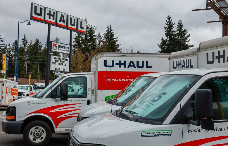 Vans await renting Friday afternoon the U-Haul rental store on Aurora Ave in Shoreline, Washington on March 24, 2023.