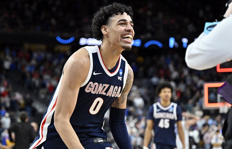 Gonzaga’s Julian Strawther (0) celebrates after the team defeated UCLA in Sweet 16 college basketball game in the West Regional of the NCAA Tournament, Thursday, March 23, 2023, in Las Vegas. (AP Photo/David Becker)