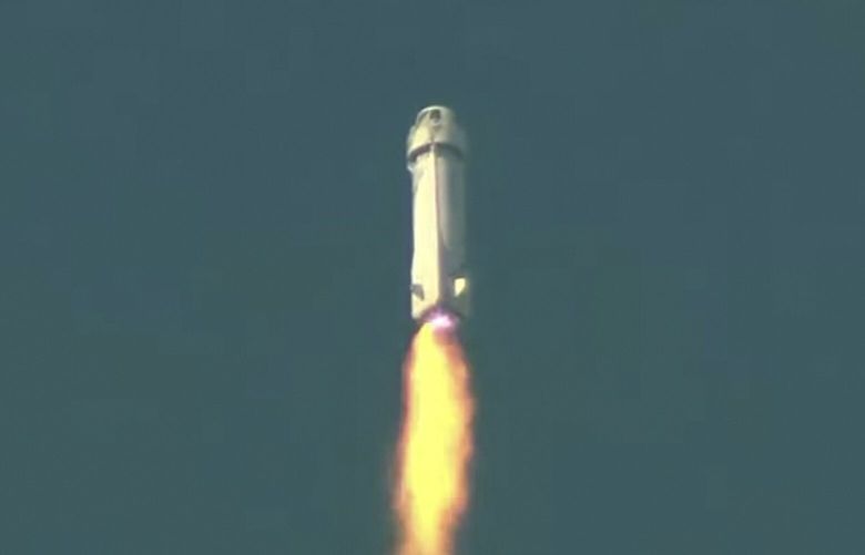 In this image from video made available by Blue Origin, the New Shepard rocket lifts off from the company’s West Texas site on Sept. 12, 2022. An overheated rocket engine nozzle caused the failure of this launch that has grounded flights for six months, the company said Friday, March 24, 2023. The vehicle was carrying experiments but no passengers. (Blue Origin via AP) NY975 NY975