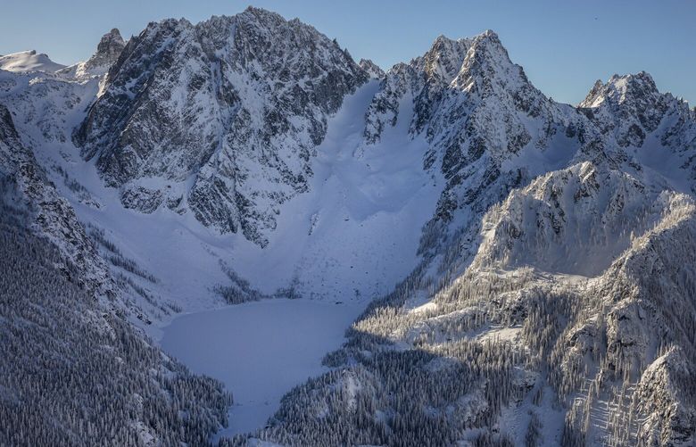 Talk with an editor before using – bh
Colchuck Peak, site of an avalanche that occurred on February 19, 2023.  Six climbers attempting to climb the peak via the northeast couloir route when an avalanche carried four down the couloir, resulting in three fatalities. 

Colchuck Peak is at center, the northeast couloir is partly sunlit. Argonaut Peak is to the right of Colchuck.  Dragontail Peak is at left, and Colchuck Lake is at lower left/center.