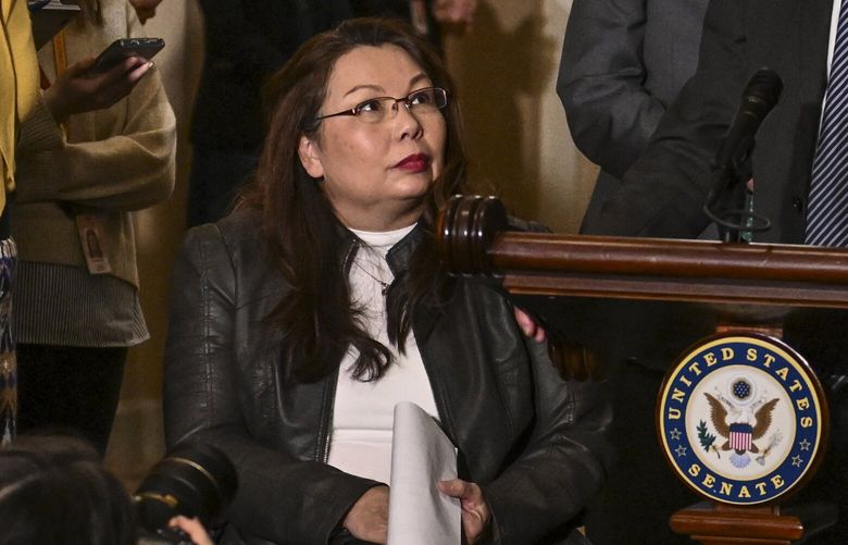 Sen. Tammy Duckworth (D-Ill.) at the U.S. Capitol on March 15. A U.S. Army helicopter that she was co-piloting in the Iraq War in 2004 was brought down by enemy fire in an attack in which she lost both legs. MUST CREDIT: Washington Post photo by Ricky Carioti