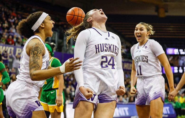 Elle Ladine lets out a roar after she gets the bucket and the foul against Oregon with just under a minute to play in the third quarter. The bucket gave Washington a 46-41 lead. 223397