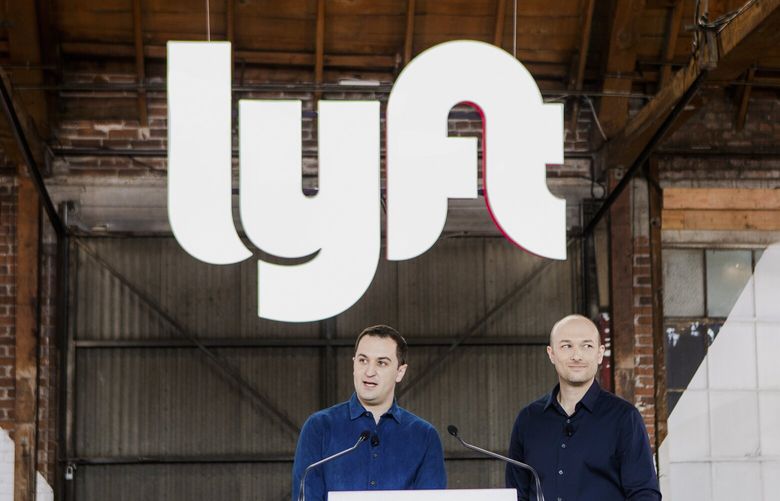  John Zimmer, left, and Logan Green, the founders of Lyft in 2019. (Alex Welsh / The New York Times)