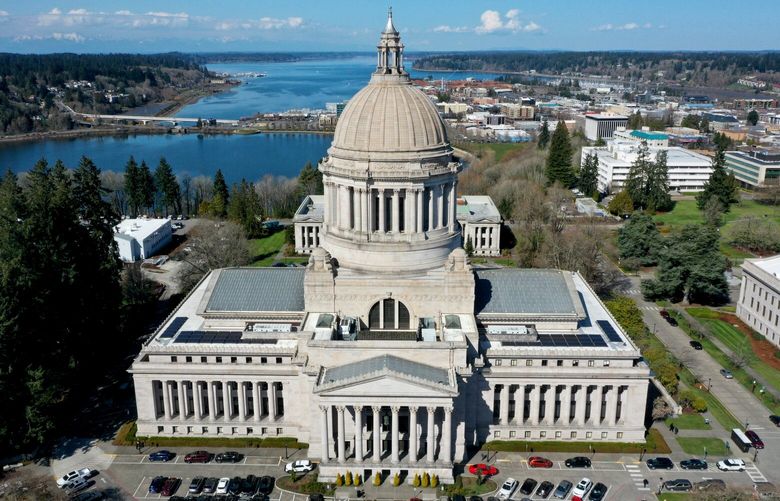 The Washington State Capitol Building and campus photographed from the air with Capitol Lake and Entrance Channel behind it in Olympia, Washington, on Wednesday, March 22, 2023.
