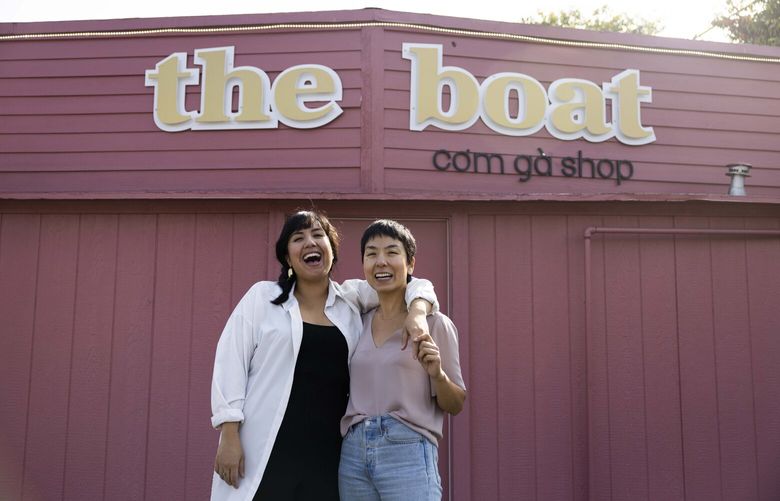 Sisters Quynh, right, and Yenvy Pham are photographed at “The Boat” at Pho Bac on Oct. 6, 2022.