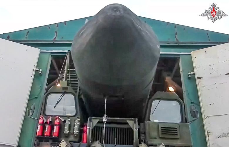 This photo made from video provided by the Russian Defense Ministry Press Service on Wednesday, March 29, 2023, shows a Yars missile launcher of the Russian armed forces being driven from a shelter in an undisclosed location in Russia. The Russian military on Wednesday launched drills of its strategic missile forces, deploying Yars mobile launchers in Siberia in a show of the country’s massive nuclear capability amid the fighting in Ukraine. (Russian Defense Ministry Press Service via AP) XAZ109 XAZ109