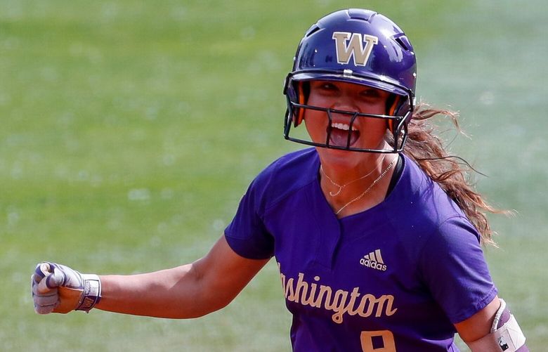 Husky Softball Stadium – NCAA regionals – University of Washington Huskies vs. University of Texas – 052222
Washington right fielder Madison Huskey after hitting the go-ahead two-run home run to put the Huskies up 2-1 during the sixth inning Sunday, May 22, 2022, in Seattle, Wash. 220462