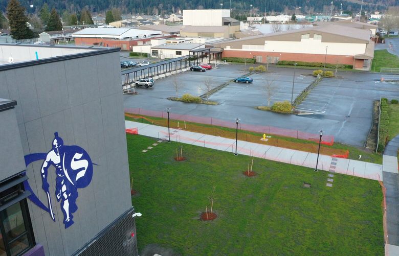 A mural of a Spartan on the side of a building at Sumner High School photographed in Sumner on Tuesday, March 7, 2023. At least six Sumner High basketball players have told police their coach, Jake Jackson, sexually abused them.