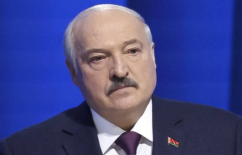 In this photo provided by the Belarusian Presidential Press Service, Belarusian President Alexander Lukashenko delivers a state-of-the nation address in Minsk, Belarus, Friday, March 31, 2023. (Belarusian Presidential Press Service via AP) XSG210 XSG210