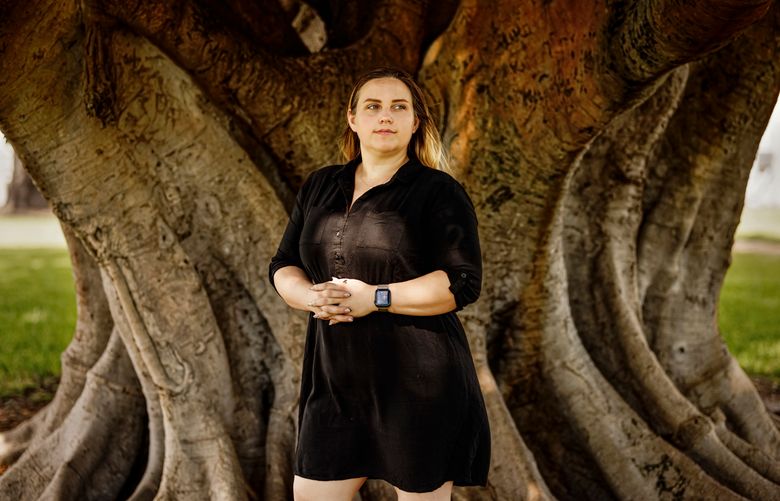 **EMBARGO: No electronic distribution, Web posting or street sales before MONDAY 03:01 A.M. ET MARCH. 6, 2023. No exceptions for any reasons. EMBARGO set by source.** Tiffany Palliser, who estimates that she worked at least 50 hours a week on average at Panera Bread, but never received overtime pay, at a park in Fort Lauderdale, Fla. on Feb. 23, 2023. New evidence shows that many employers are mislabeling rank-and-file workers as managers to avoid paying them overtime. (Scott McIntyre/The New York Times)