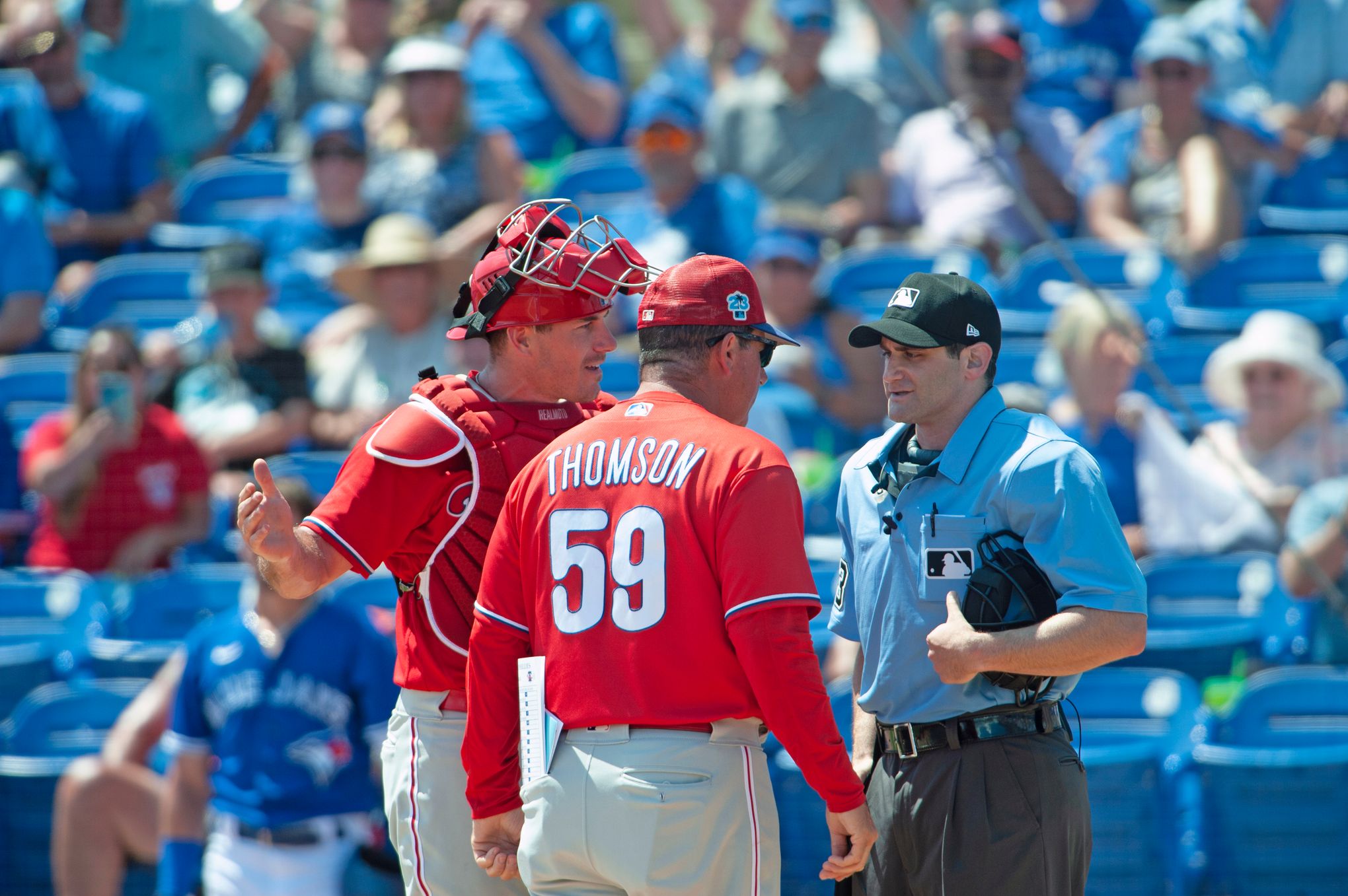 Phillies catcher J.T. Realmuto was ejected after he moved his glove while  the umpire tried to hand him the ball 👀