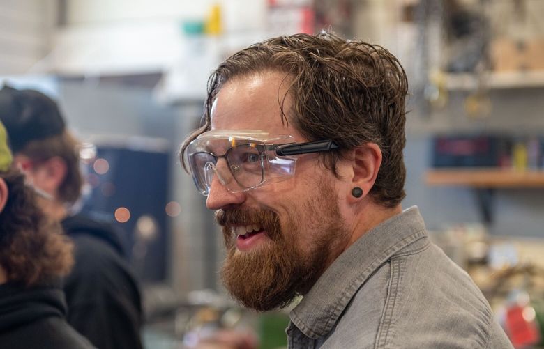 Matt Kennedy, right, is an auto instructor for the Methow Valley School District. The school district got several million dollars in private grant money to redo its welding and auto tech training space, which is located in a nonprofit called TwispWorks.