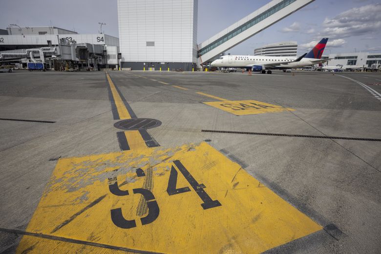 Pilots use guidelines like these when parking at airport gates. These lines lead to the South Satellite terminal. 
(Ellen M. Banner / The Seattle Times)
