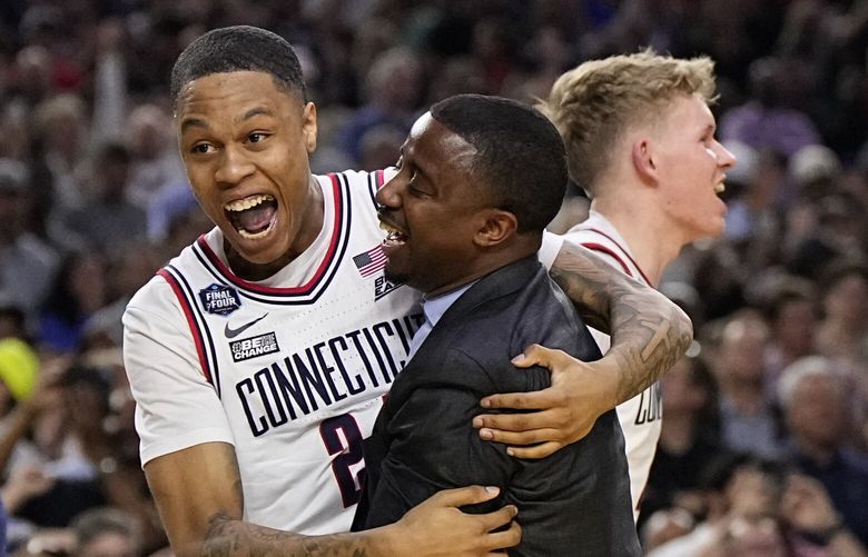 Connecticut guard Jordan Hawkins celebrates after the men’s national championship college basketball game against San Diego State in the NCAA Tournament on Monday, April 3, 2023, in Houston. (AP Photo/Brynn Anderson) TXCC163 TXCC163