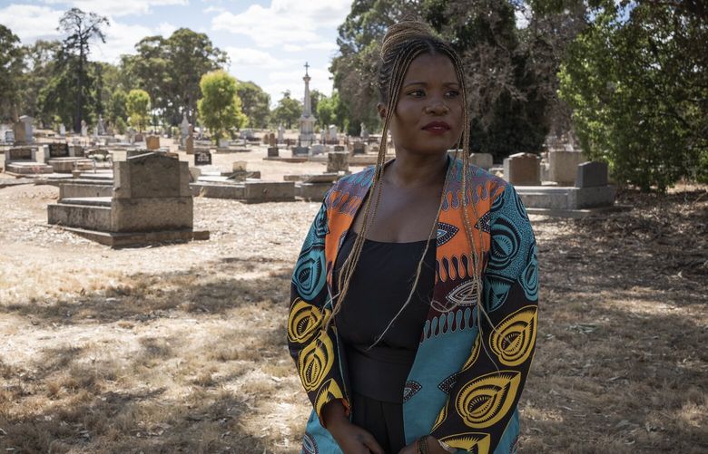 Santilla Chingaipe, an Australian journalist who featured John Joseph’s story in a documentary about the country’s forgotten Black history, at White Hills Cemetery, where he was buried in an unmarked grave in 1858, in Bendigo, Australia on Feb. 27, 2023. At the ceremony, Caroline Kennedy, the United States ambassador to Australia, unveiled a new plaque with a shiny American flag and a summary of Joseph’s life. (Christina Simons/The New York Times) XNYT54 XNYT54