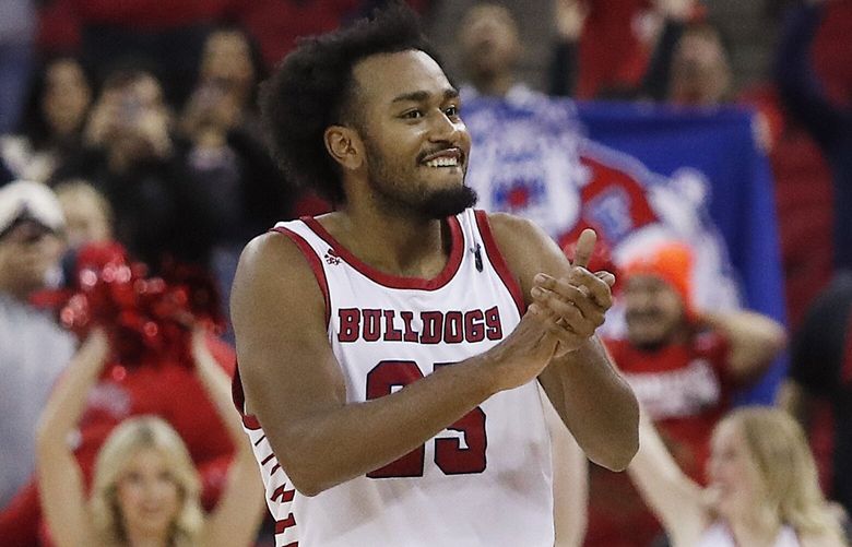 Fresno State’s Anthony Holland celebrates the team’s win over New Mexico in an NCAA college basketball game in Fresno, Calif., Tuesday, Jan. 3, 2023. (AP Photo/Gary Kazanjian)