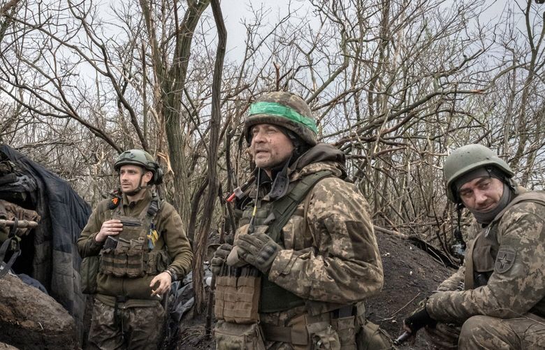 Ukrainian soldiers scan the horizon for Russian troops in southern Bakhmut, in the Donetsk region in eastern Ukraine, April 7, 2023. A trove of leaked Pentagon documents, exposed on social media sites, reveals the depleted Russian military’s struggle in Ukraine. (Mauricio Lima/The New York Times) XNYT64 XNYT64