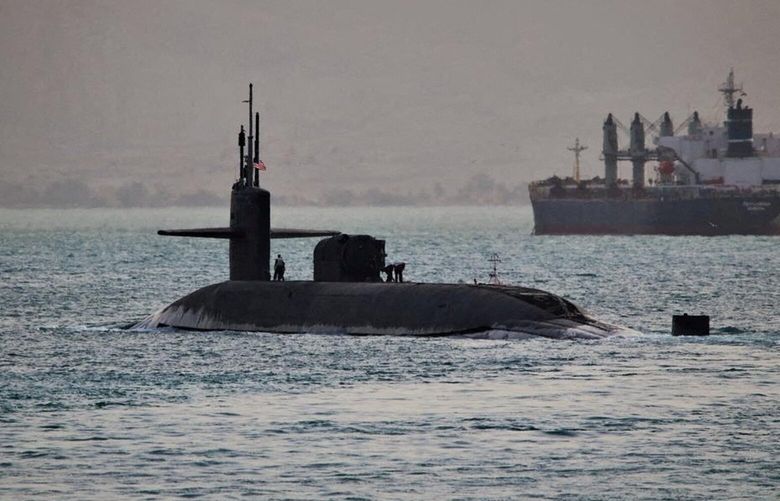 In a photo released by the U.S. Navy, the U.S.S. Florida submarine transits the Suez Canal in Egypt on Friday, April 7, 2023. The Navy said on Saturday that it had deployed a guided missile submarine to the Middle East, a warning advising all ships to proceed with caution following escalating tensions between Iran and Israel. (Elliot Schaudt/U.S Navy Central Command via The New York Times) – NO SALES – FOR EDITORIAL USE ONLY – XNYT138 XNYT138