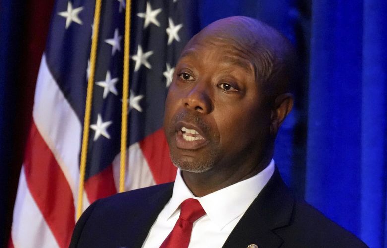 FILE – Sen. Tim Scott, R-S.C., gives a speech at a Black History Month dinner hosted by the Charleston County GOP on Feb. 16, 2023, in Charleston, S.C. Scott is taking the next official step toward a bid for president in 2024. The Republican is set to announce the formation of an exploratory committee, according to a person familiar with his plans who spoke with The Associated Press, Tuesday, April 11, 2023, on the condition on anonymity so as not to get ahead of the official announcement. (AP Photo/Meg Kinnard, File) NYAB220 NYAB220